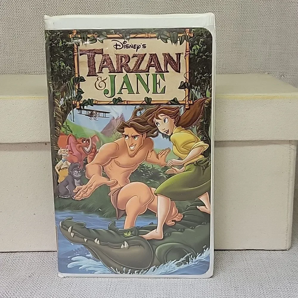Disney‎ Tarzan and Tarzan & Jane vhs movies, Tarzan figure,book other figures